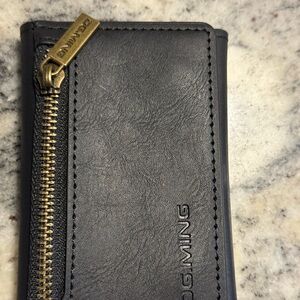Dom Ming Black Leather Card Holder for iphones.    Case also for iphone 16